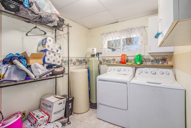 laundry area featuring cabinet space and washer and clothes dryer