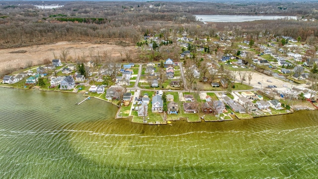aerial view featuring a water view and a residential view