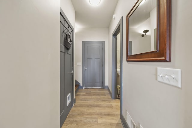 hall featuring light wood-style floors