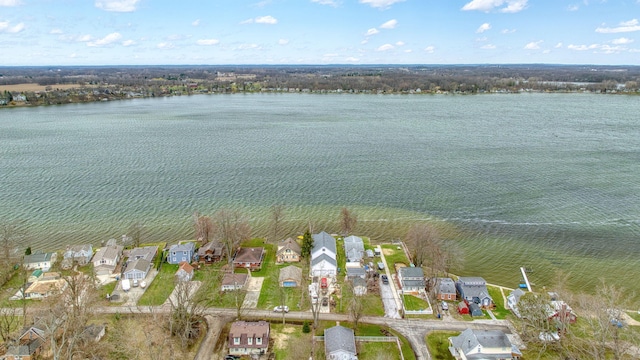 aerial view featuring a water view and a residential view