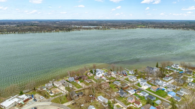 aerial view with a residential view and a water view