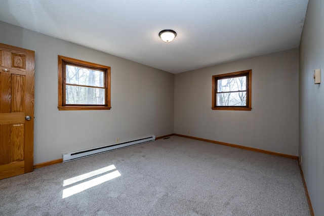 2532 Ridgewood Trl, Berrien Springs, MI 49103 - unfurnished room featuring carpet flooring, a baseboard heating unit, and baseboards