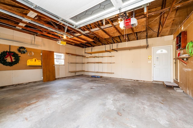 2532 Ridgewood Trl, Berrien Springs, MI 49103 - garage featuring a garage door opener