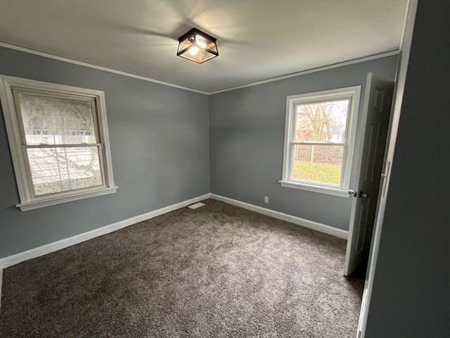4651 Berkshire St, Detroit, MI 48224 - unfurnished room with baseboards, carpet flooring, and crown molding