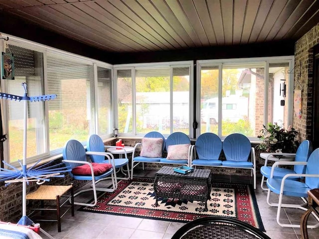 sunroom with an outdoor hangout area