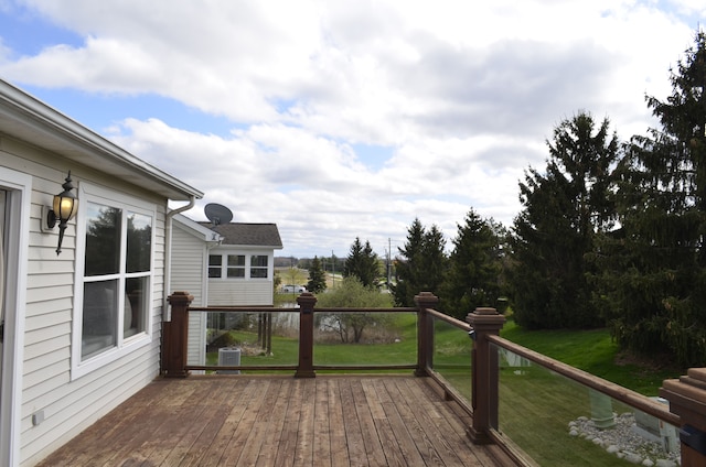 wooden deck with a yard