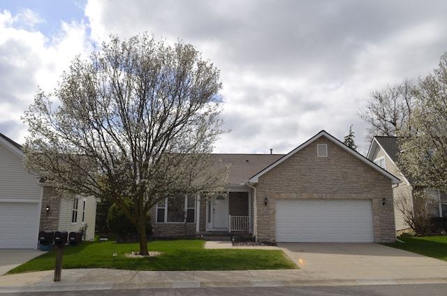 ranch-style home featuring concrete driveway, a front lawn, stone siding, and a garage