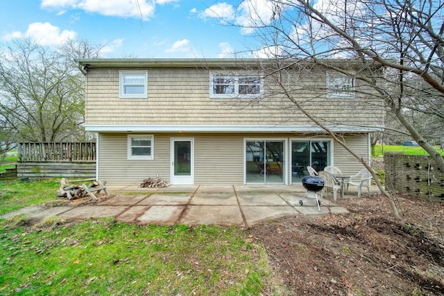 rear view of house featuring a patio