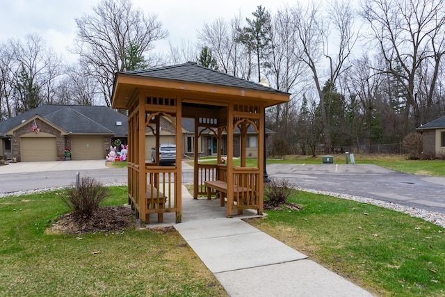 21329 Mulberry Ct, Farmington Hills, MI 48336 - view of home's community featuring a garage, a yard, fence, a gazebo, and driveway
