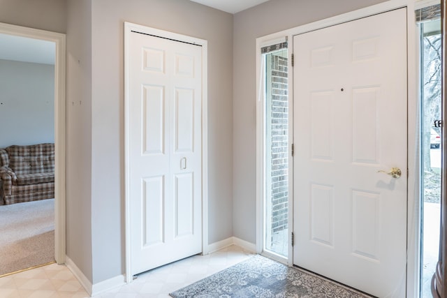 21329 Mulberry Ct, Farmington Hills, MI 48336 - foyer featuring baseboards and light floors
