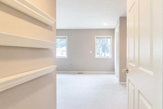 21329 Mulberry Ct, Farmington Hills, MI 48336 - hall featuring light carpet and baseboards