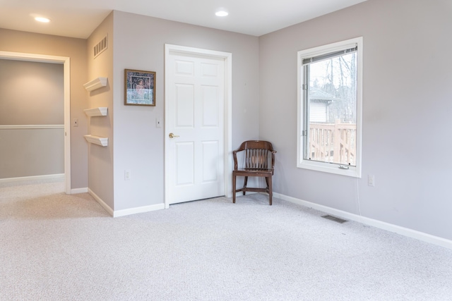 21329 Mulberry Ct, Farmington Hills, MI 48336 - living area with carpet, visible vents, and baseboards