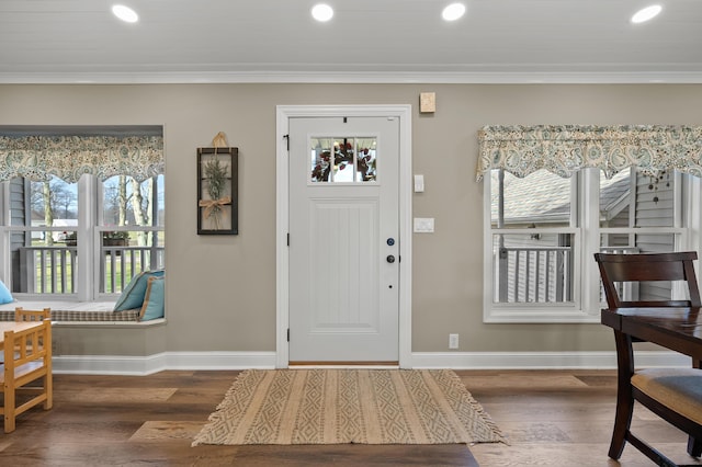 entrance foyer with wood finished floors, baseboards, and recessed lighting