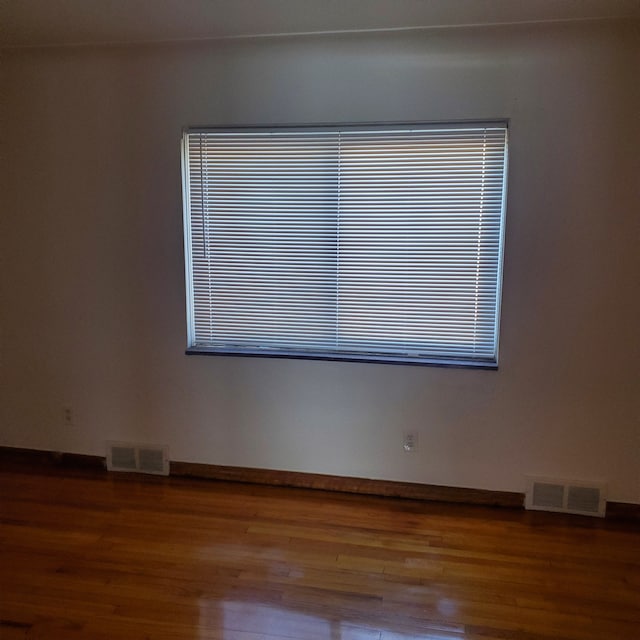 20209 Stotter St, Detroit, MI 48234 - empty room with wood finished floors and visible vents