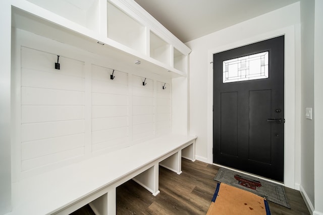 6522 Ellinwood Dr, White Lake, MI 48383 - mudroom featuring dark wood-type flooring and baseboards