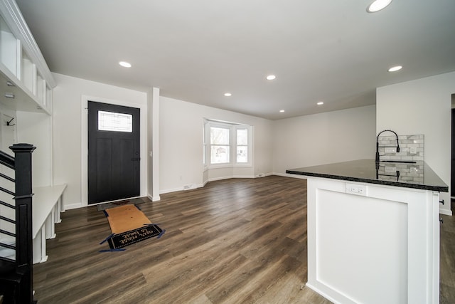 6522 Ellinwood Dr, White Lake, MI 48383 - kitchen featuring recessed lighting, dark wood-style flooring, baseboards, and a sink