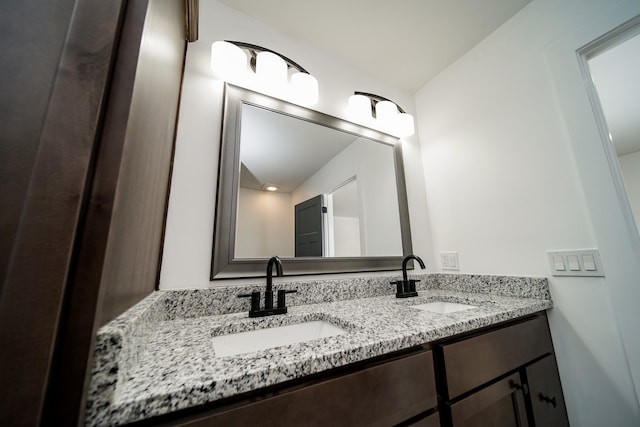 6522 Ellinwood Dr, White Lake, MI 48383 - bathroom featuring double vanity and a sink