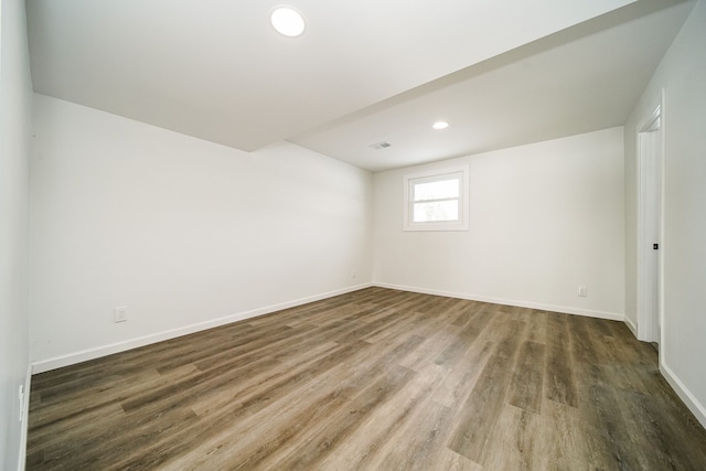6522 Ellinwood Dr, White Lake, MI 48383 - spare room featuring recessed lighting, visible vents, baseboards, and wood finished floors
