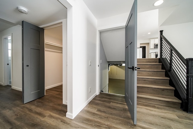6522 Ellinwood Dr, White Lake, MI 48383 - stairs with baseboards, recessed lighting, and wood finished floors