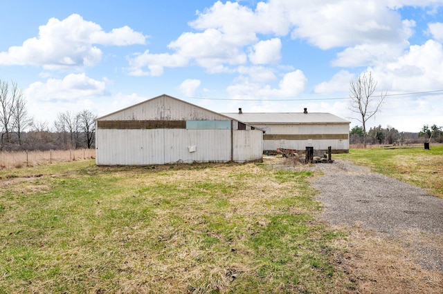 6357 Baldwin Rd, Swartz Creek, MI 48473 - view of pole building with a lawn