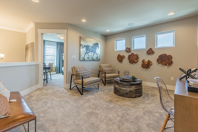 sitting room featuring baseboards, recessed lighting, and carpet