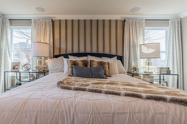 bedroom featuring wallpapered walls