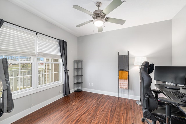 office space featuring wood finished floors, baseboards, and a ceiling fan