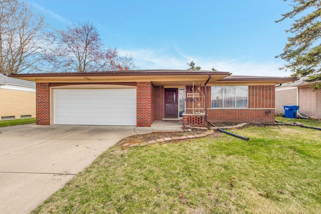 ranch-style home featuring brick siding, a front yard, driveway, and a garage