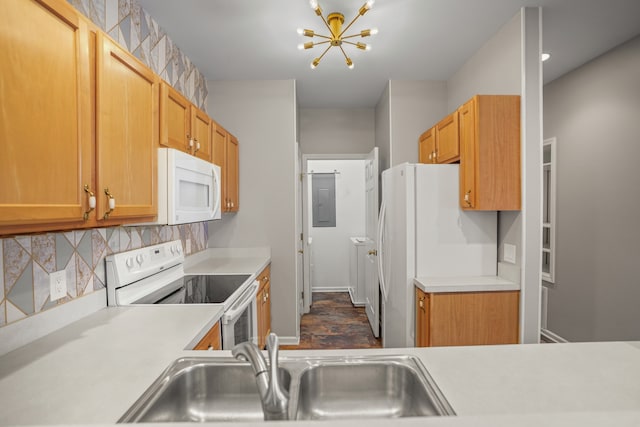 10025 Sunrise Dr, Grand Blanc, MI 48439 - kitchen featuring white appliances, a chandelier, light countertops, decorative backsplash, and electric panel