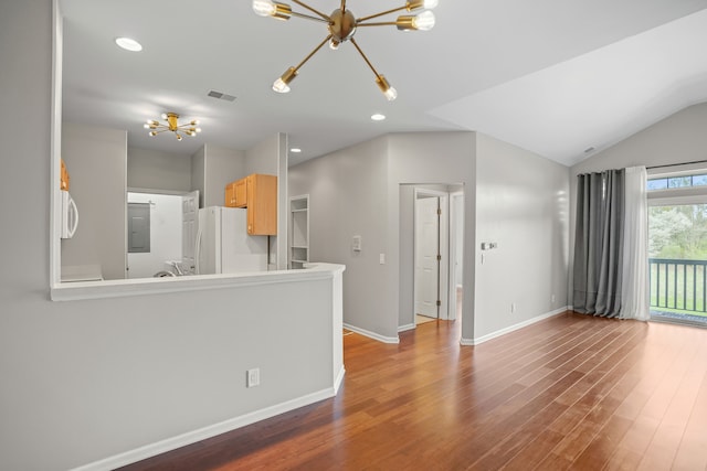 10025 Sunrise Dr, Grand Blanc, MI 48439 - unfurnished living room featuring a chandelier, electric panel, wood finished floors, lofted ceiling, and recessed lighting