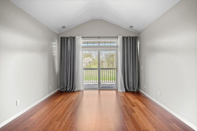 10025 Sunrise Dr, Grand Blanc, MI 48439 - unfurnished room with lofted ceiling and wood finished floors