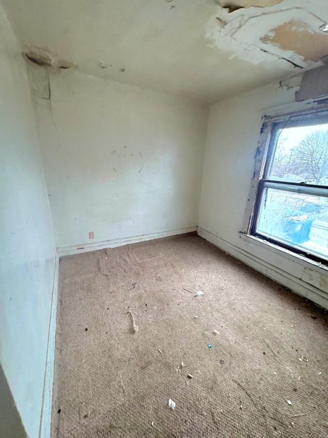 view of carpeted spare room