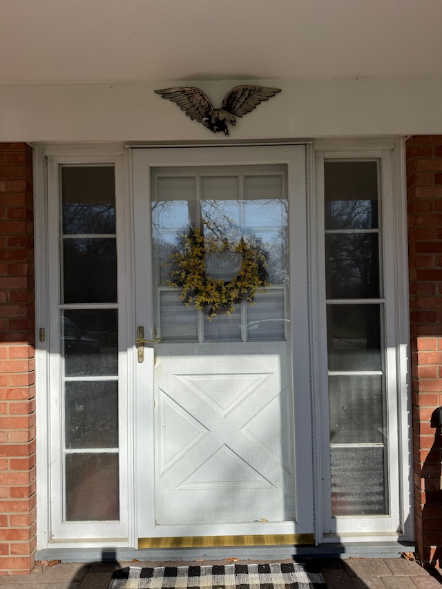 2126 Holly Tree Dr, Davison, MI 48423 - doorway to property featuring brick siding