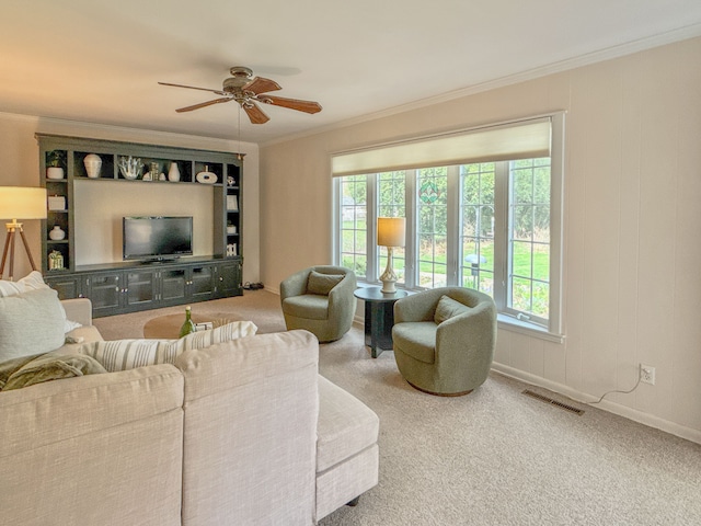 2126 Holly Tree Dr, Davison, MI 48423 - living room with crown molding, ceiling fan, carpet, and baseboards