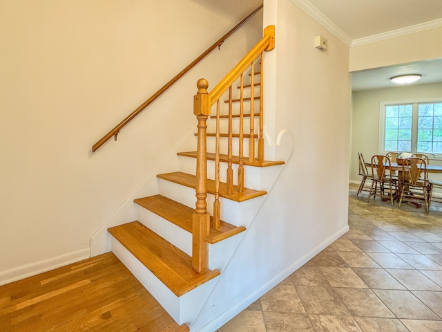 2126 Holly Tree Dr, Davison, MI 48423 - stairs featuring ornamental molding and baseboards
