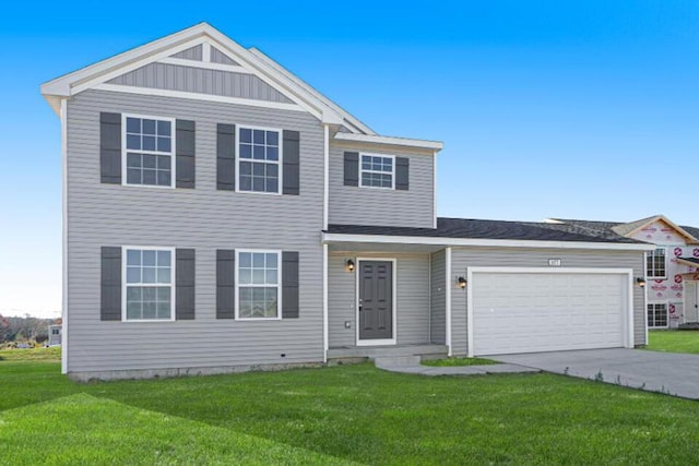 20836 Rolling Hills Ln, Big Rapids, MI 49307 - view of front of property featuring a front lawn, a garage, and driveway