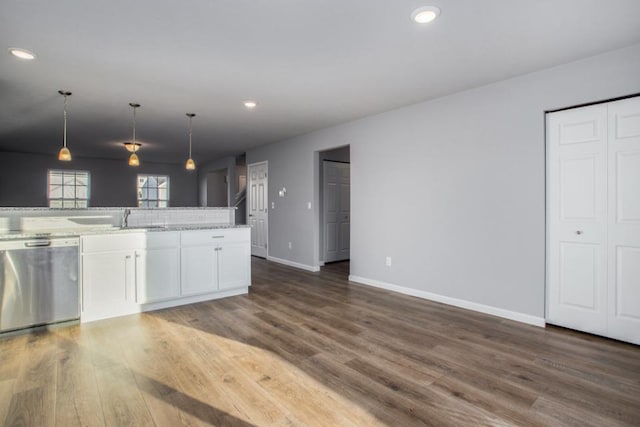 20836 Rolling Hills Ln, Big Rapids, MI 49307 - kitchen featuring stainless steel dishwasher, wood finished floors, white cabinetry, recessed lighting, and decorative light fixtures