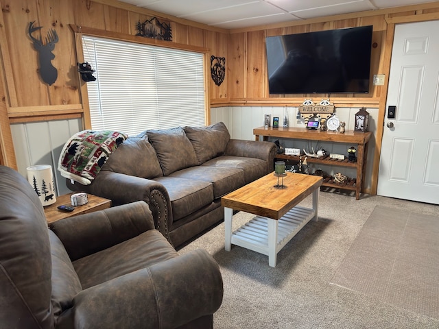 10953 Johnston Blvd, Saint Helen, MI 48656 - carpeted living room with wood walls
