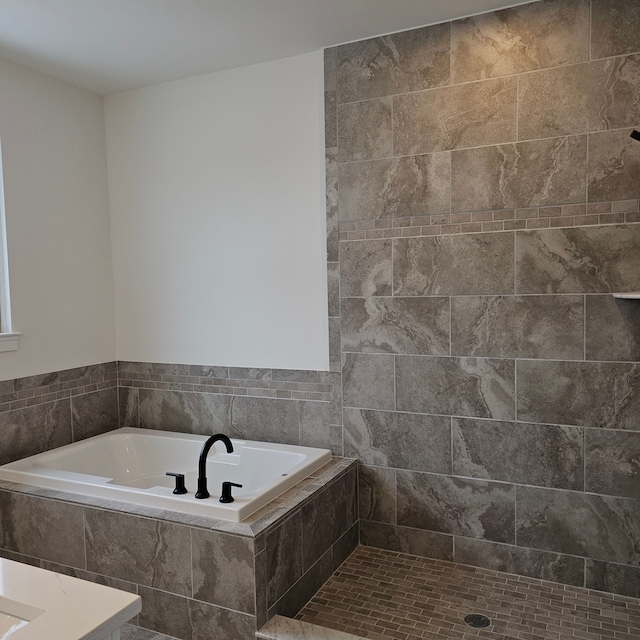 bathroom featuring a bath