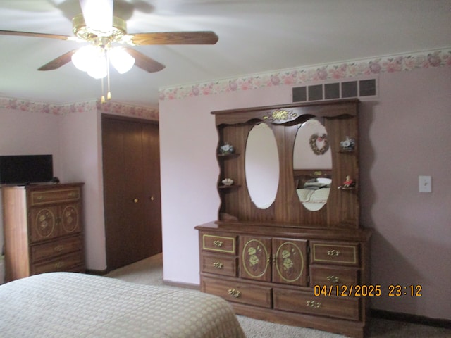 14879 Riverside St, Livonia, MI 48154 - carpeted bedroom featuring a ceiling fan