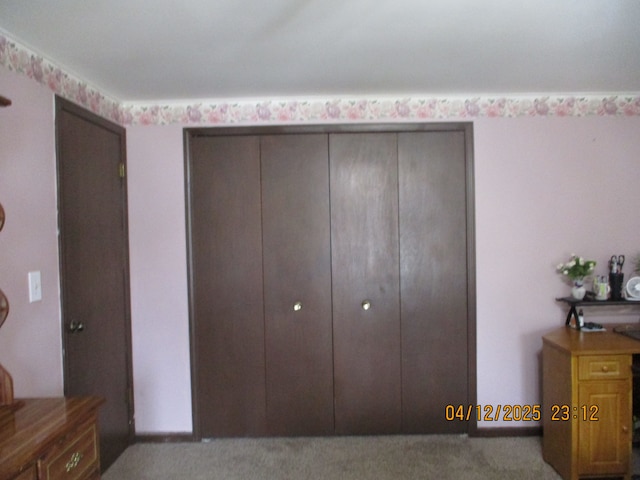 14879 Riverside St, Livonia, MI 48154 - unfurnished bedroom with carpet and a closet