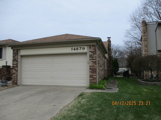 14879 Riverside St, Livonia, MI 48154 - view of side of property with concrete driveway, brick siding, an attached garage, and a yard