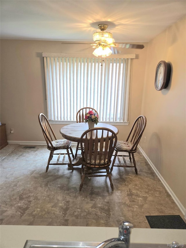 14879 Riverside St, Livonia, MI 48154 - dining space featuring ceiling fan and plenty of natural light
