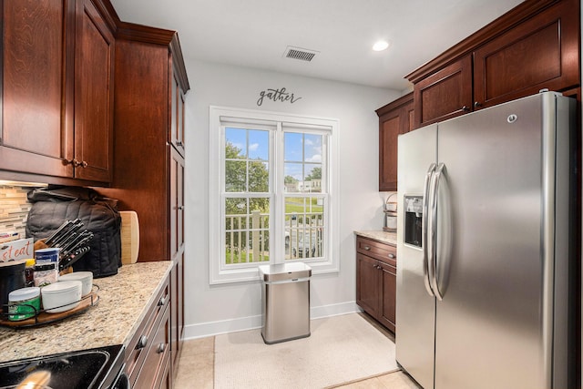 kitchen with visible vents, baseboards, recessed lighting, stainless steel appliances, and decorative backsplash
