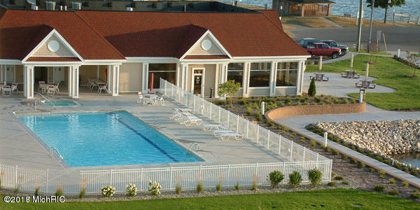 pool with a patio area and a fenced backyard