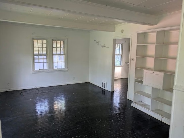 2557 Tiffin St, Flint, MI 48504 - empty room with plenty of natural light, dark wood-style floors, beamed ceiling, baseboards, and ornamental molding