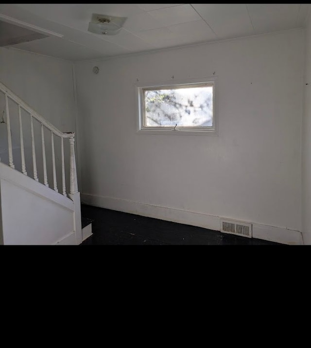 2557 Tiffin St, Flint, MI 48504 - spare room with baseboards