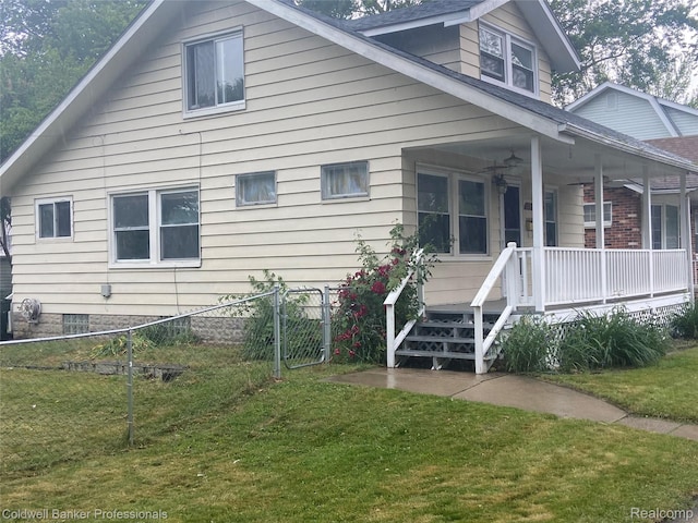 22106 Avalon St, Saint Clair Shores, MI 48080 - view of side of property featuring a ceiling fan and a porch
