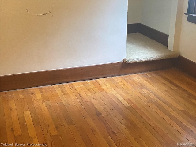 22106 Avalon St, Saint Clair Shores, MI 48080 - spare room with hardwood / wood-style floors and baseboards
