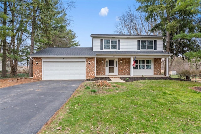 3715 W Hiawatha Dr, Okemos, MI 48864 - traditional home with a garage, a porch, a front lawn, brick siding, and driveway